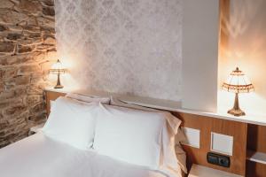 A bed or beds in a room at PR Campanas de San Juan