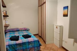 Katil atau katil-katil dalam bilik di Lanza Tomasi Apartment - centre