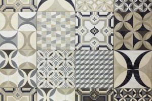 un grupo de patrones diferentes en una pared de azulejos en White Stylish Apartments, en Vico Equense