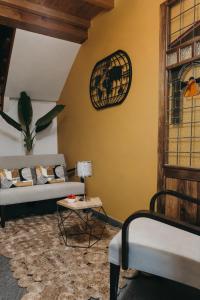 A seating area at PR Campanas de San Juan