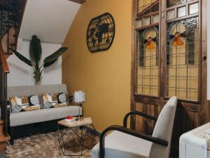 A seating area at PR Campanas de San Juan