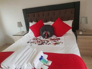 A bed or beds in a room at Vaticious