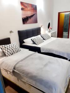 Ένα ή περισσότερα κρεβάτια σε δωμάτιο στο Apartment ANI 1