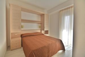 Postel nebo postele na pokoji v ubytování Hotel Incanto
