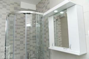 A bathroom at VESTA Apartman