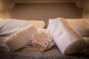 A bed or beds in a room at Casale la Meridiana
