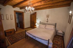 A bed or beds in a room at Casale la Meridiana
