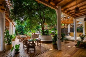 Κήπος έξω από το Carpe Diem Casitas & Villas Mazunte