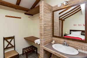 a bathroom with a sink and a mirror at Luna House Cusco in Cusco