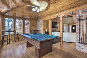 a pool table in a room with a ceiling at Upscale Home with Seasonal Pool Near Historic Rte 66 in Vinita