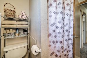 a bathroom with a toilet and a shower at Family-Friendly Cortez Cedar House with Yard! in Cortez +17 photos