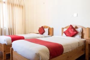 Letto o letti in una camera di ROKPA Guest House