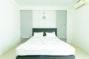 Katil atau katil-katil dalam bilik di Central View Hostel