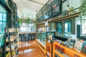 a grocery store with a store counter with at Phi Phi Andaman Legacy Resort-SHA Plus in Phi Phi Islands