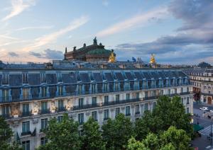 a large white building with a dome on top of it at InterContinental Paris Le Grand by IHG in Paris
