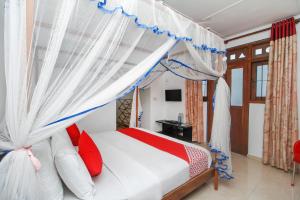 מיטה או מיטות בחדר ב-FEEL Villa