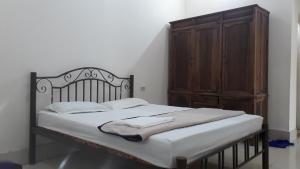 Postel nebo postele na pokoji v ubytování Bong Mai