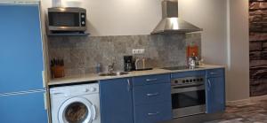 Kuchyňa alebo kuchynka v ubytovaní Apartamento Sol deluxe Suances