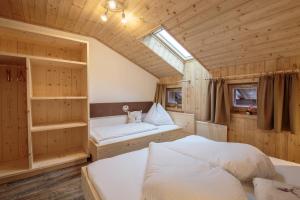 Letto o letti in una camera di Appartements Grünholz