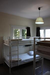 Postel nebo postele na pokoji v ubytování Pella Inn Hostel