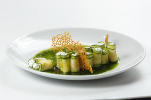 a plate of food on a white plate at Paloma House in Kharkiv