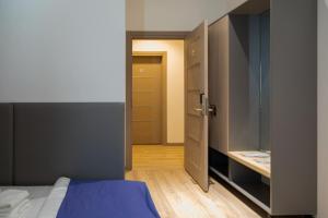 Postel nebo postele na pokoji v ubytování Hotel IRIS