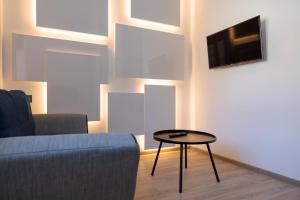 TV a/nebo společenská místnost v ubytování Hotel IRIS
