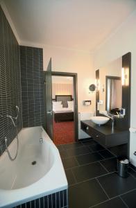 Kylpyhuone majoituspaikassa Top Hotel Krämer