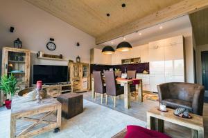 Posezení v ubytování Penthouse Tauberblick