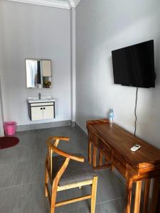 Μια τηλεόραση ή/και κέντρο ψυχαγωγίας στο Mean Leap Guesthouse