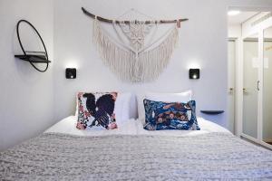 Postel nebo postele na pokoji v ubytování Boutique Hotel Yöpuu