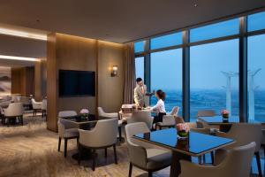 Televiisor ja/või meelelahutuskeskus majutusasutuses InterContinental Quanzhou by IHG