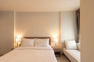 Postel nebo postele na pokoji v ubytování Hua Hin La Casita 492