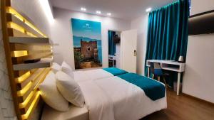 Postel nebo postele na pokoji v ubytování Athenian Montaza Hotel + 37 fotografií