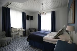Postel nebo postele na pokoji v ubytování Boutique Hotel Yöpuu