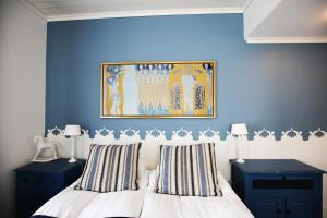Postel nebo postele na pokoji v ubytování Boutique Hotel Yöpuu
