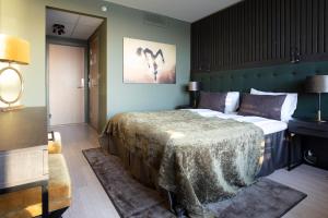Postel nebo postele na pokoji v ubytování Rømskog Spa & Resort - Unike Hoteller