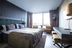 Postel nebo postele na pokoji v ubytování Rømskog Spa & Resort - Unike Hoteller