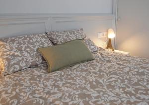 Postel nebo postele na pokoji v ubytování Vinyet Sitges