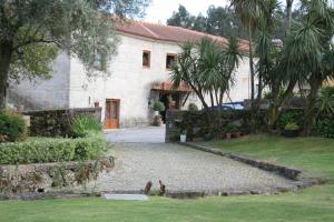 Сад в Hotel Rural de Charme Maria da Fonte