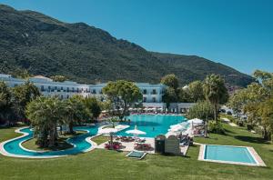 an aerial view of a resort with a pool at Mitsis Galini in Kamena Vourla