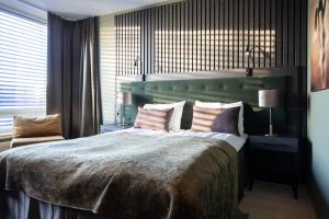 Postel nebo postele na pokoji v ubytování Rømskog Spa & Resort - Unike Hoteller