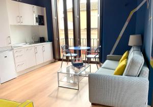 Kuchyň nebo kuchyňský kout v ubytování Ritual Sevilla Suites Centro