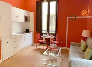 Kuchyň nebo kuchyňský kout v ubytování Ritual Sevilla Suites Centro