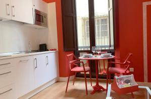 Kuchyň nebo kuchyňský kout v ubytování Ritual Sevilla Suites Centro