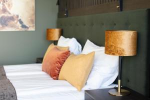Postel nebo postele na pokoji v ubytování Rømskog Spa & Resort - Unike Hoteller