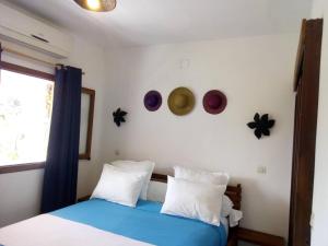 Postel nebo postele na pokoji v ubytování SATRANA HOTEL TAMATAVE