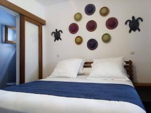 Postel nebo postele na pokoji v ubytování SATRANA HOTEL TAMATAVE