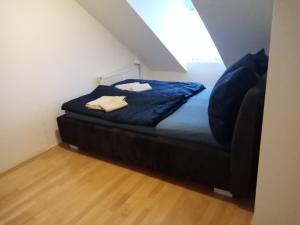 Postel nebo postele na pokoji v ubytování Apartmany Lend
