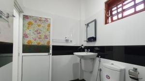 Un baño de Bandulas Beach House